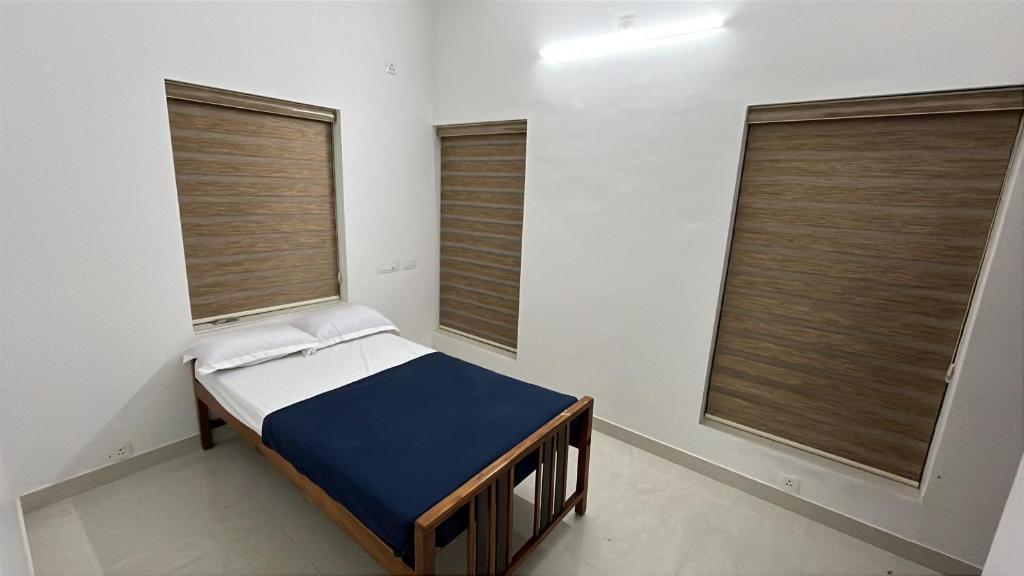 Comfortable bedroom family villa Kochi