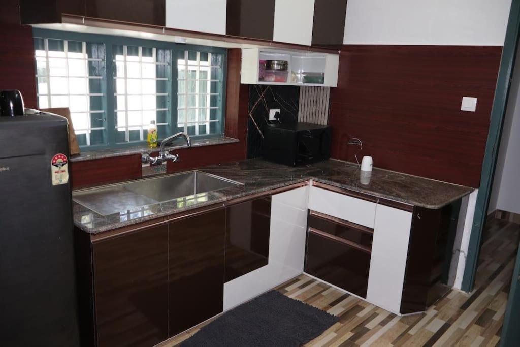 Modern bathroom with hot water villa Kochi